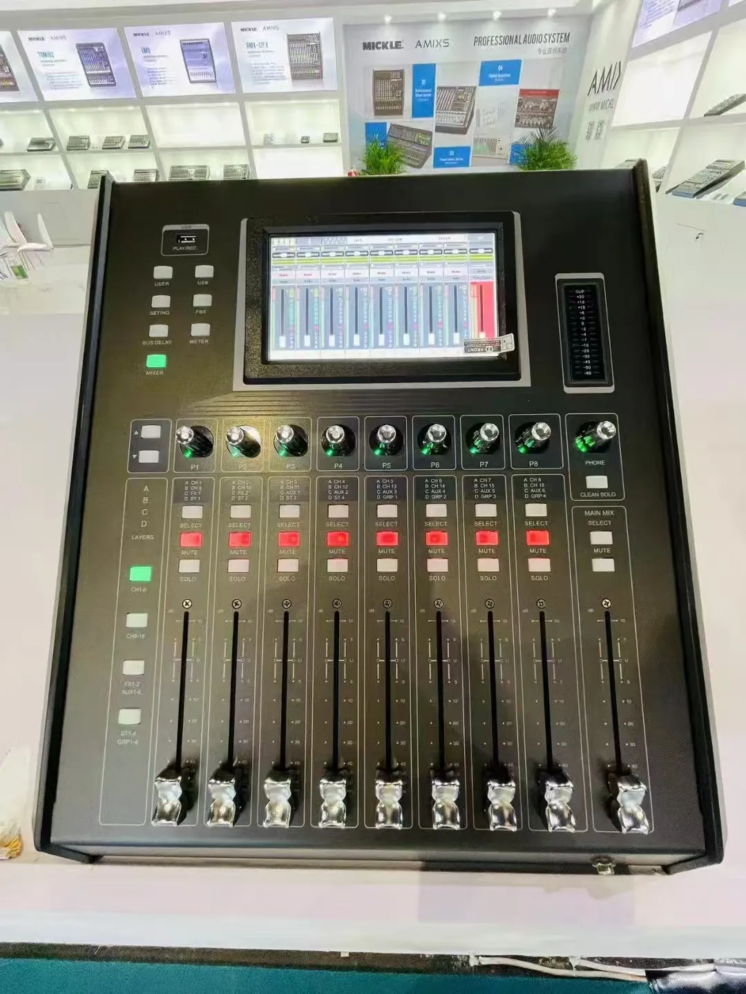 Compact digital mixer with touchscreen at the AMIXS exhibition booth